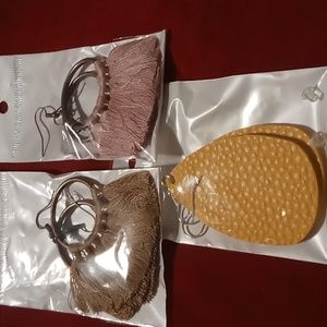Shein earrings 3 pairs 1 leather drop & 2 feathered earrings with a brass hoop.